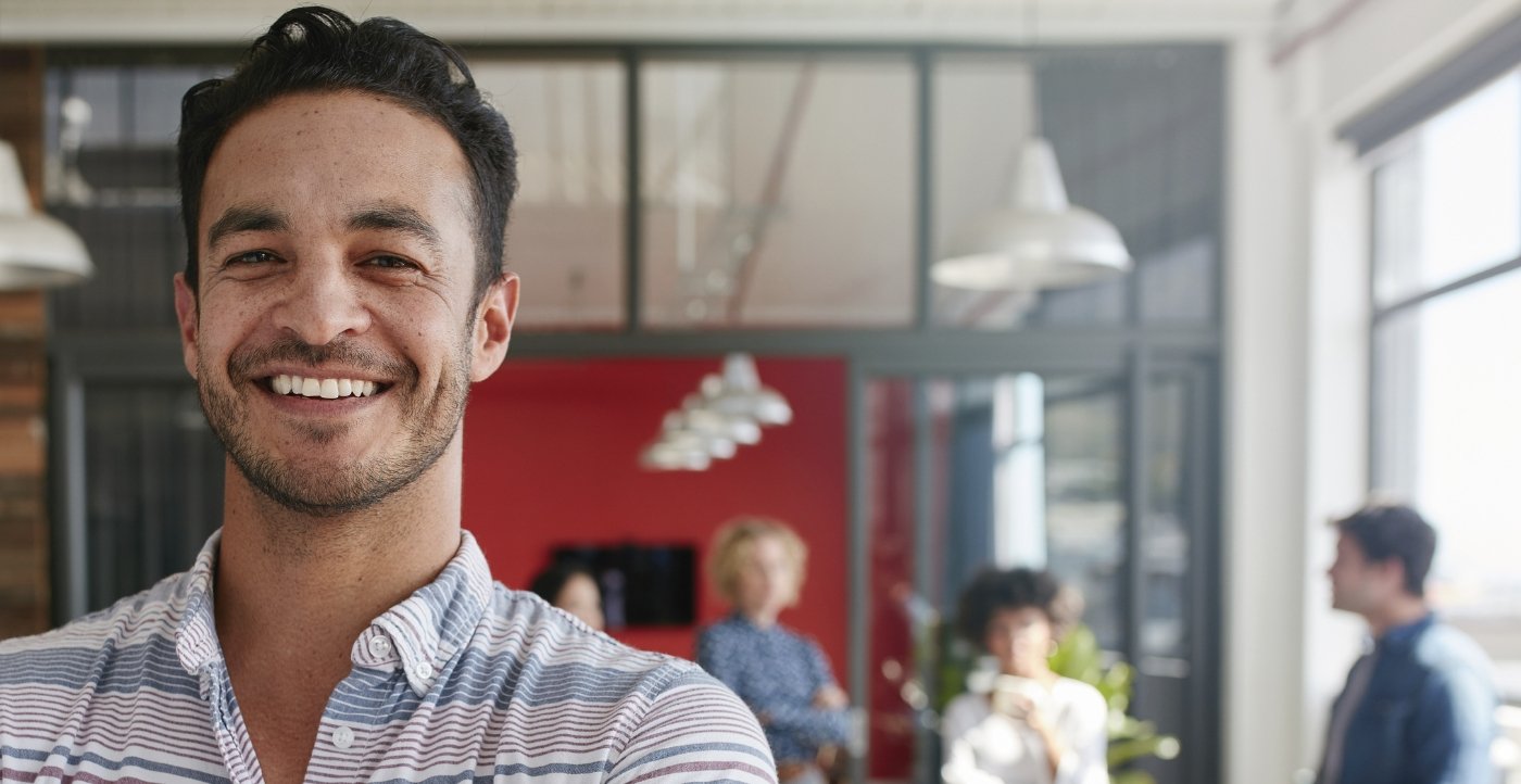 Man with healthy smile after periodontal disease treatment