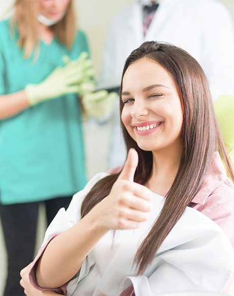 Patient in Huntsville giving thumbs-up after BOTOX